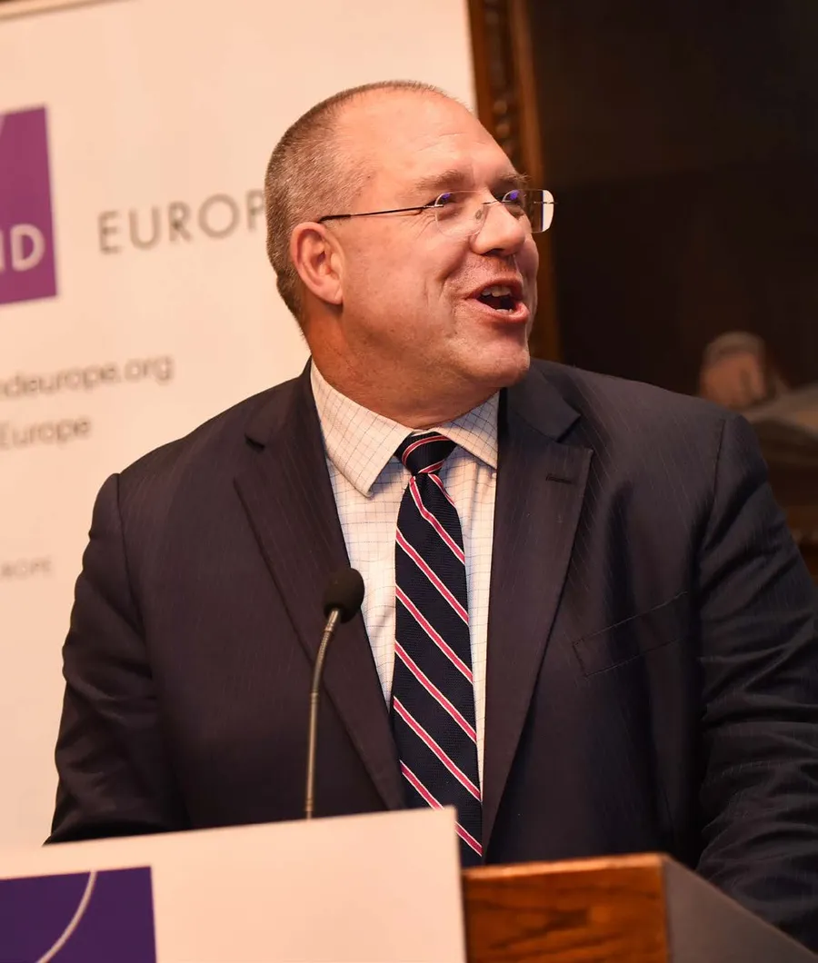 Hans Pung, President of RAND Europe, speaking at a lectern.